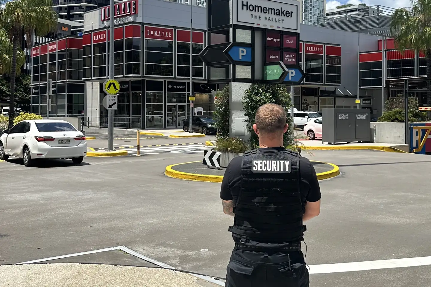 Elite Squad security officer watching the car park entry of a Brisbane retail centre